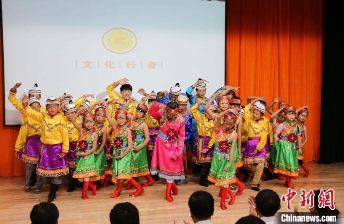 圖為蘭州大學(xué)文化行者團(tuán)隊(duì)走進(jìn)民族社區(qū)，開展系列活動。(資料圖)蘭州大學(xué)供圖